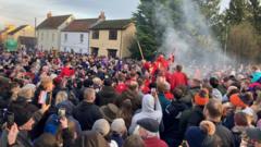 Hundreds join huge scrum for medieval game